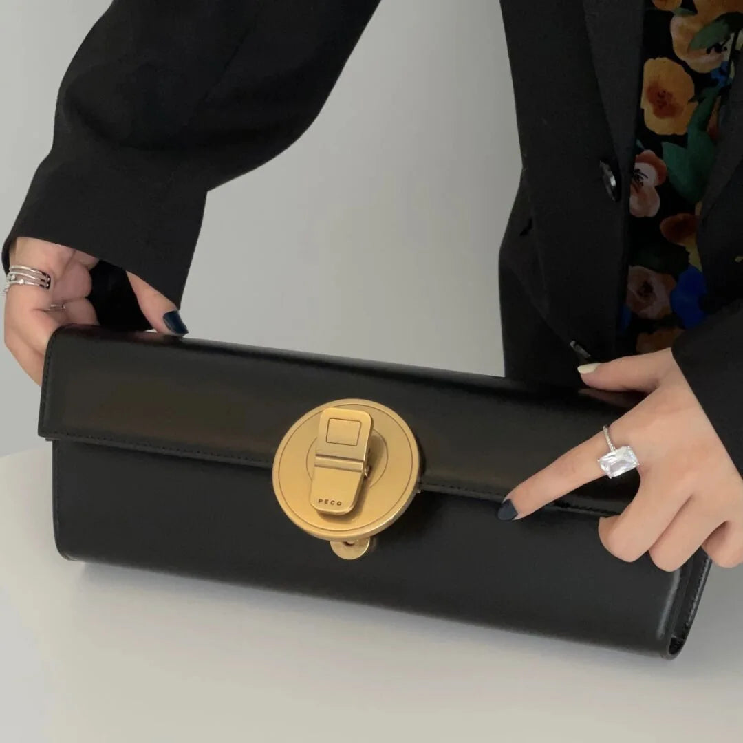 The Royale Gold Emblem Clutch Purse