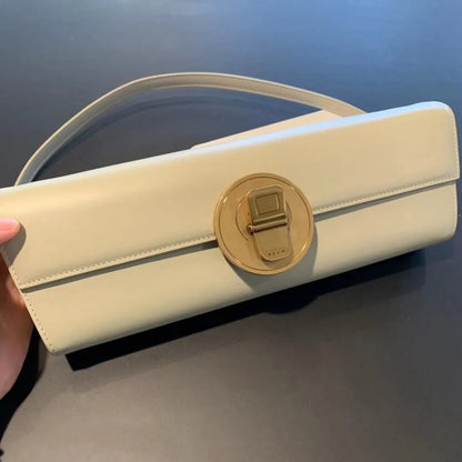 The Royale Gold Emblem Clutch Purse