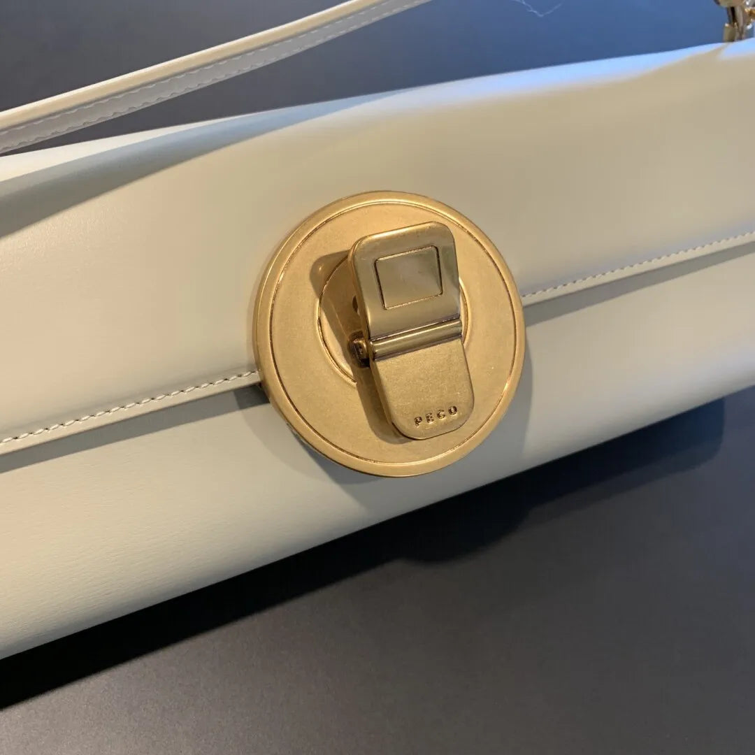 The Royale Gold Emblem Clutch Purse