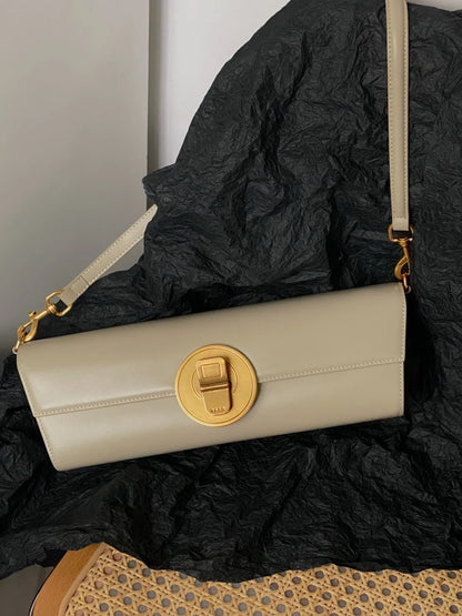 The Royale Gold Emblem Clutch Purse