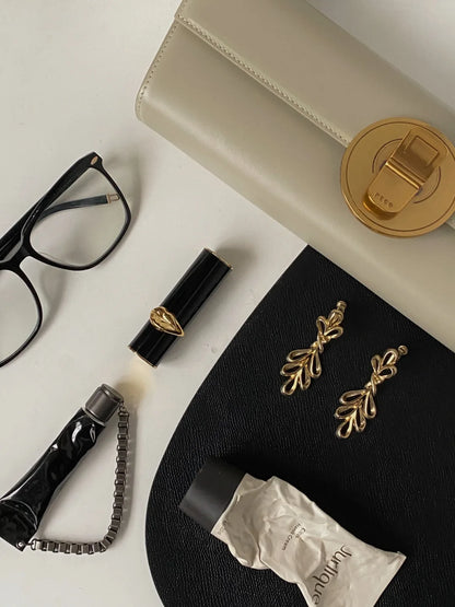 The Royale Gold Emblem Clutch Purse