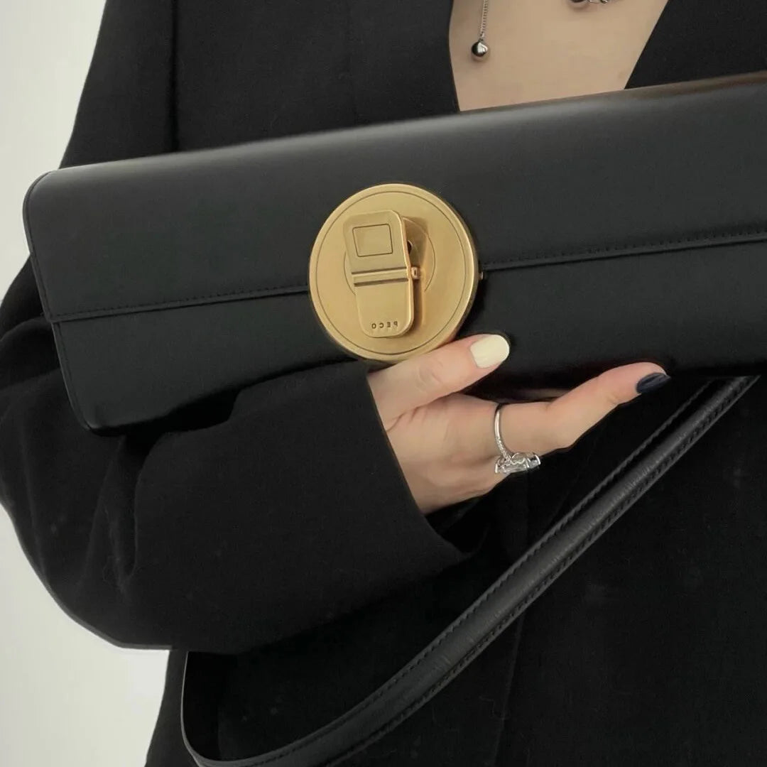 The Royale Gold Emblem Clutch Purse