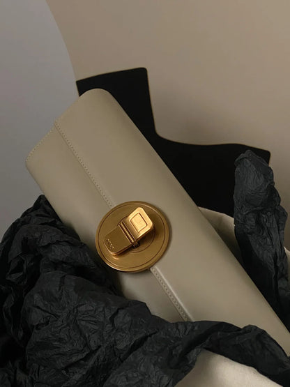 The Royale Gold Emblem Clutch Purse