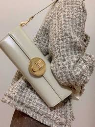 The Royale Gold Emblem Clutch Purse